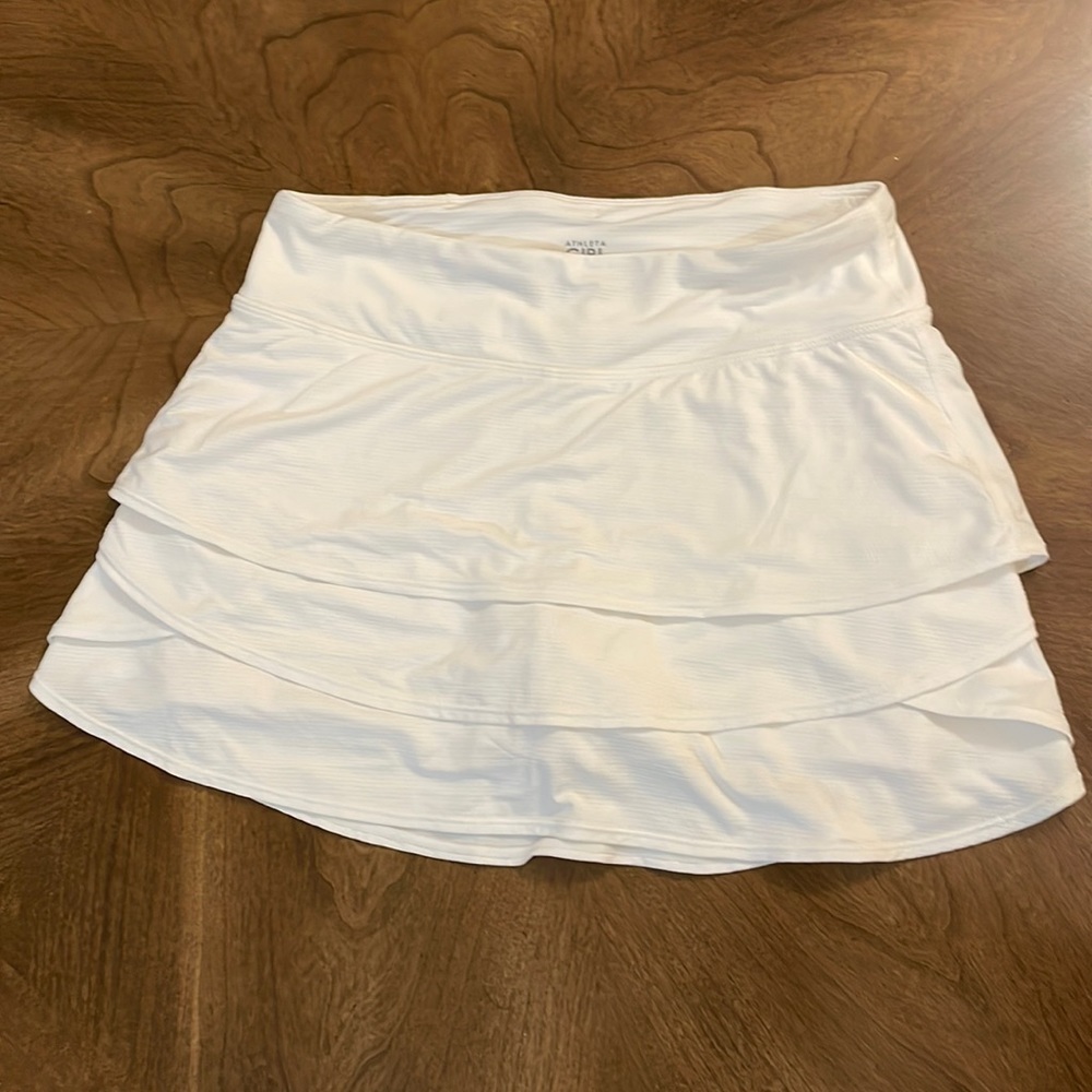Lightly used Athleta girl swing skirt size L or 12. Great for tennis!